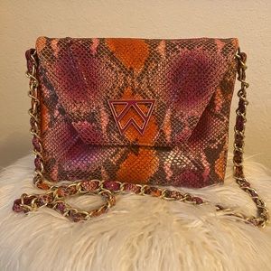 Kelly Wynne Cloud 9 Clutch/Crossbody/Wristlet in pink/orange snakeskin